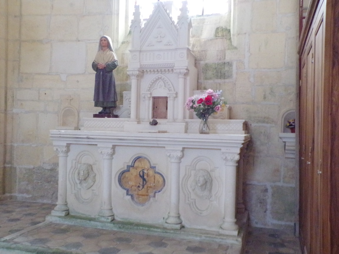 Juillac-le-Coq - L'église Saint-Martin - Un modillon (18 septembre 2016)